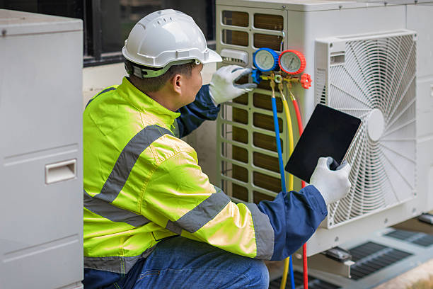 Professional Air Conditioning Repair technician working in Dunlap, IN